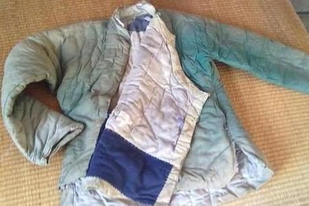 梦到盖衣服是什么意思_梦见盖衣服预示什么